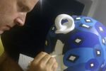 Riempimento degli elementi geometrici (rombi) sulla superficie della statua